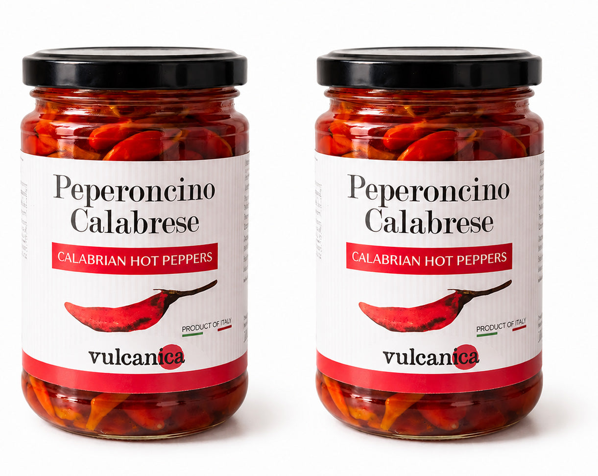 Jar of Peperoncino Calabrese with a white label on a white background