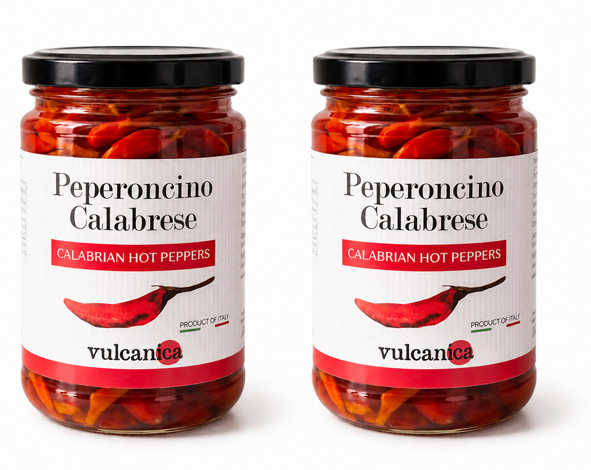 Jar of Peperoncino Calabrese with a white label on a white background