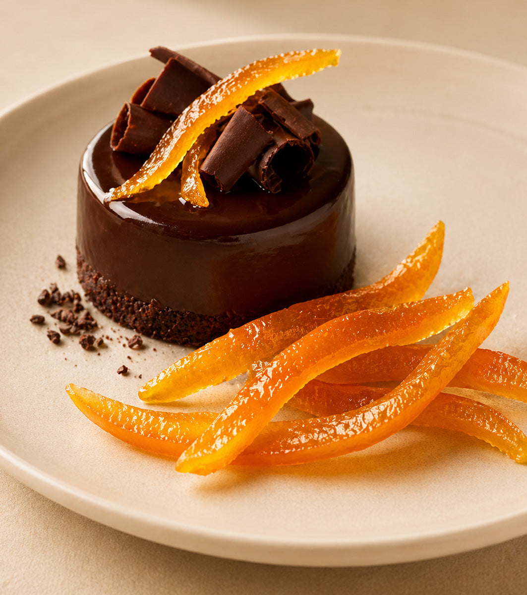 Candied orange peels decorating a chocolate cake 