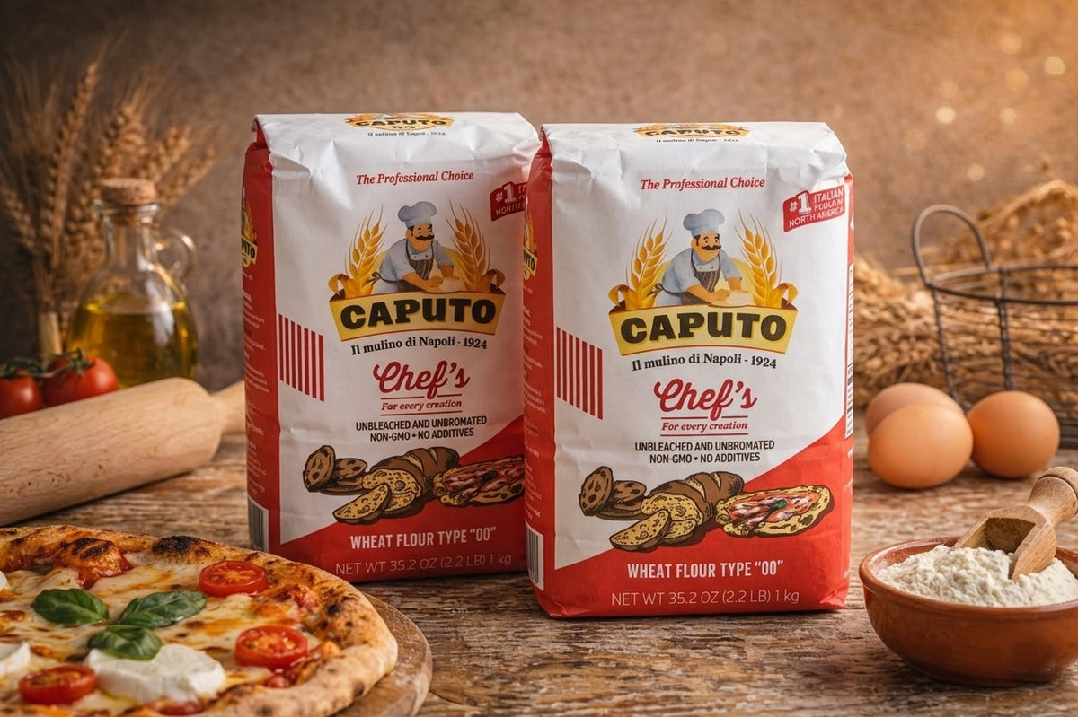 Two bags of Caputo flour with a pizza and kitchen items on a wooden table.