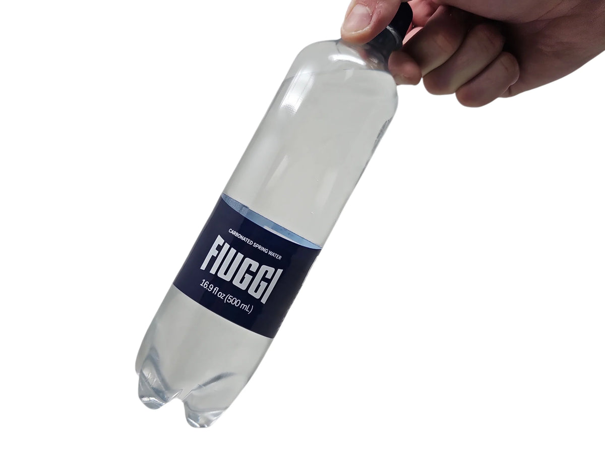 Fiuggi to go Sparkling in  a mans hand 
