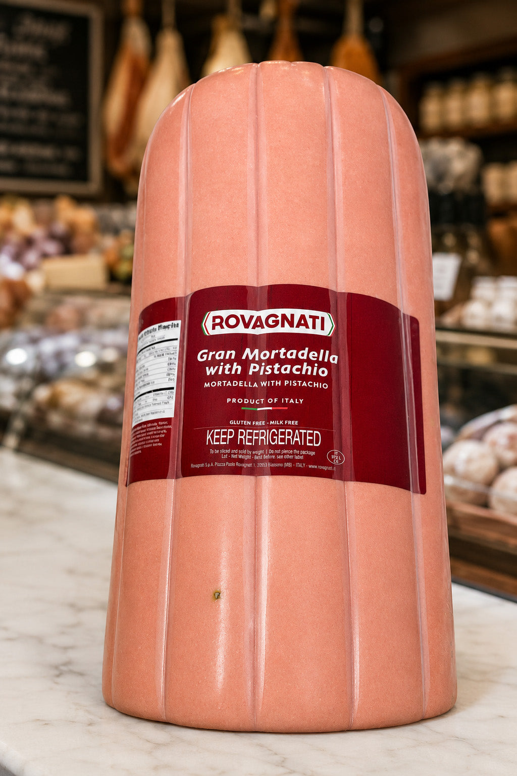 Rovagnati Gran Mortadella with Pistachio displayed on our deli counter 