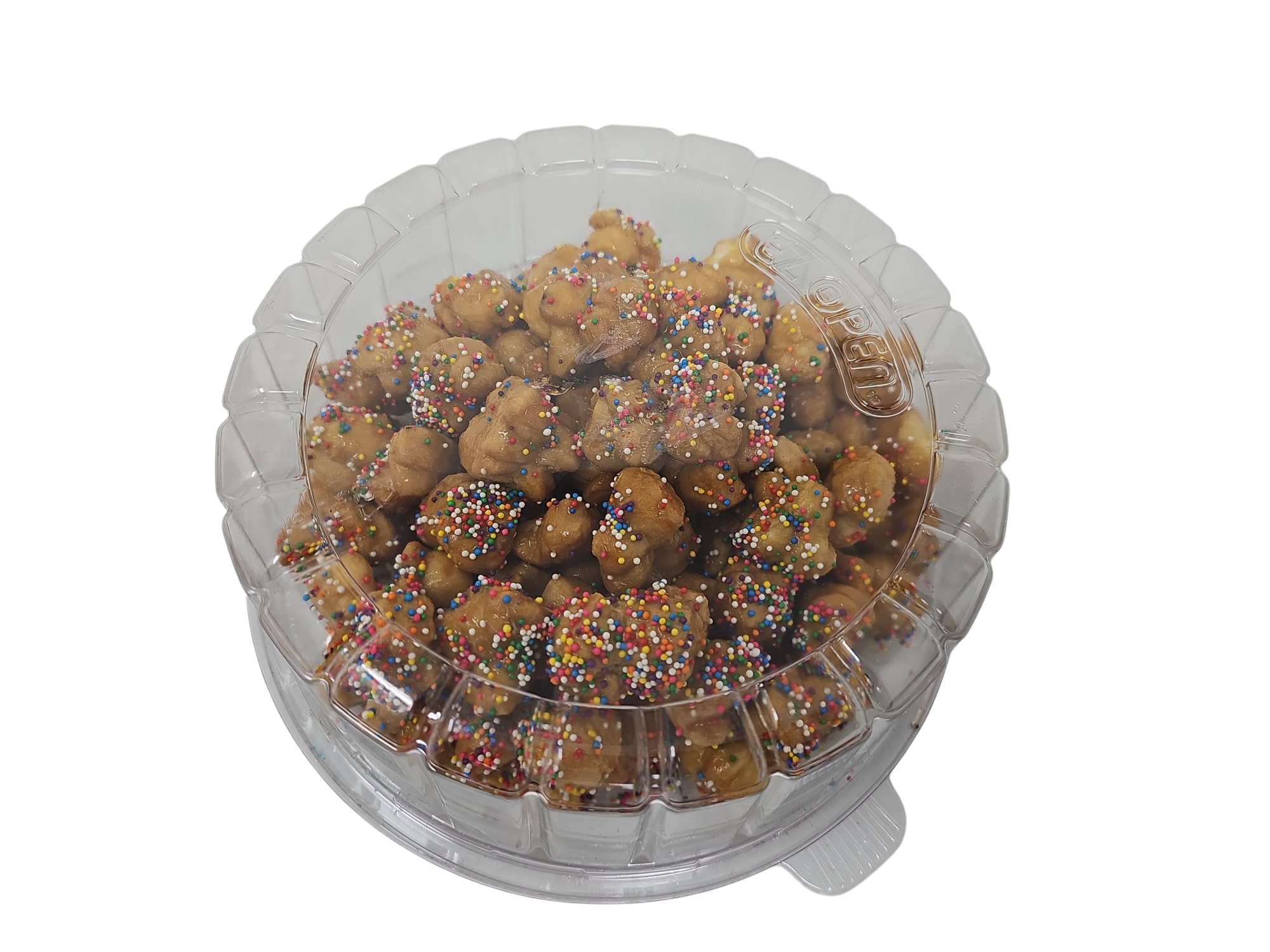 Clear container with struffoli  treats on a white background