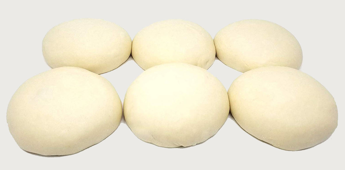 "Six fresh balls of Frank and Sal's authentic NYC pizza dough, ready for making homemade pizza."