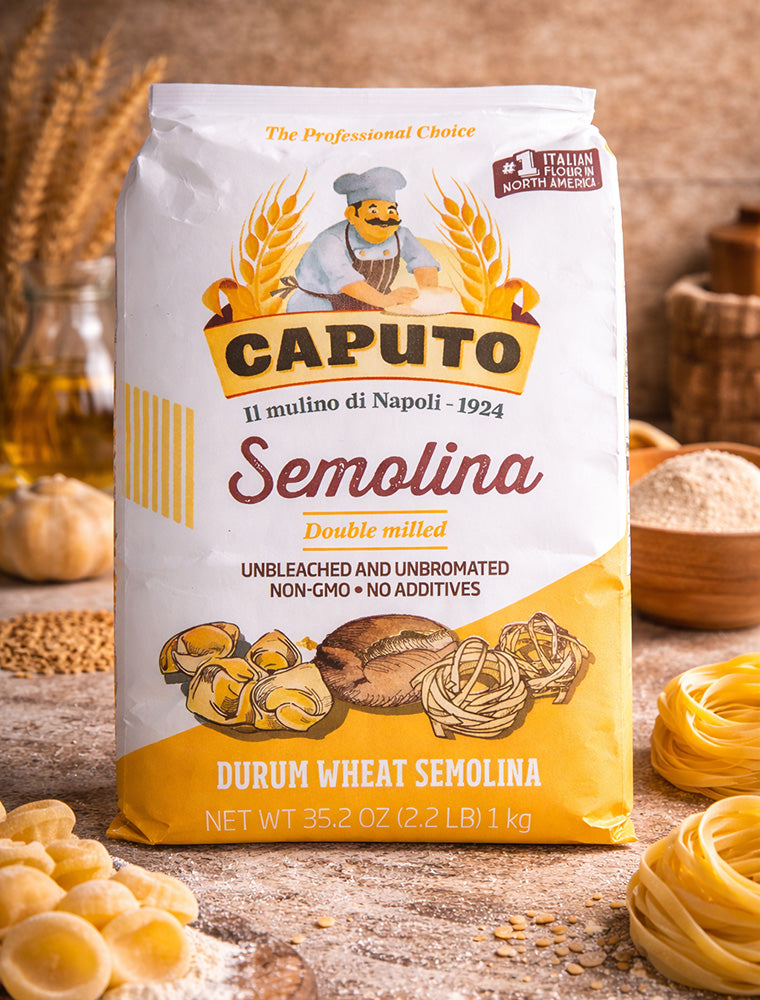 Bag of Caputo Semolina with pasta and wheat on a wooden surface