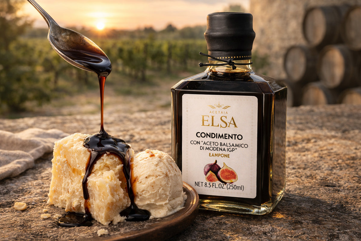 Fig Balsamic Vinegar reduction being drizzled over a dessert with a bottle of Elsa balsamic condiment in the background.