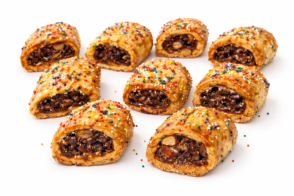 Italian Fig Cookies with sprinkles on a white background