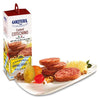 Box of Golfera Cooked Cotechino with a plate of sliced sausages and accompaniments on a white background