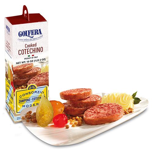 Box of Golfera Cooked Cotechino with a plate of sliced sausages and accompaniments on a white background