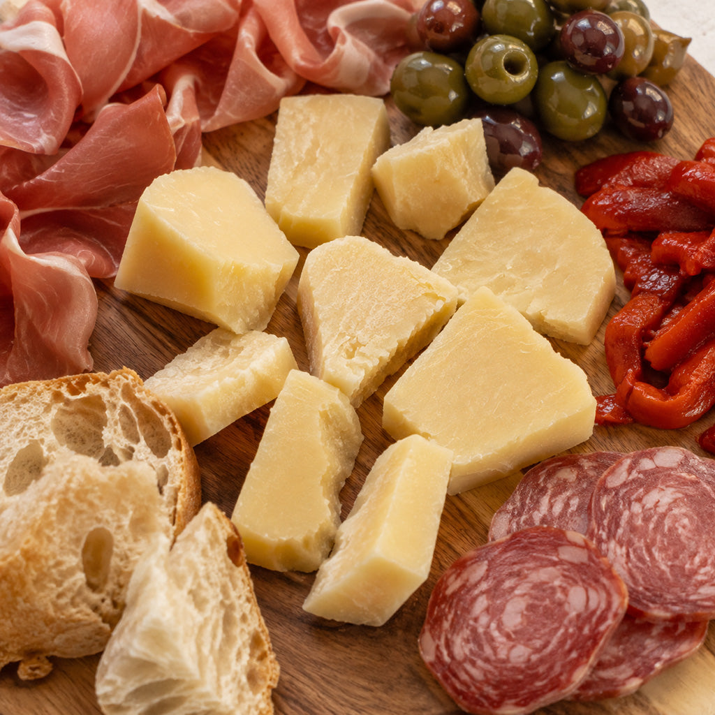 Auricchio Stravecchio Provolone pieces served with Italian antipasto